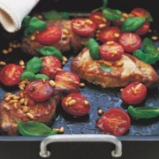 Roast Pork Steaks with Tomatoes and Pine nuts 